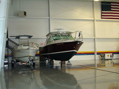 Pelican Hangar Flight Operations Center is a 16,500 square foot storage facility is adjacent to Charlevoix Municipal Airport's taxi strip.