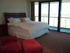 This is a view of one fo two bedrooms available at Charlevoix’s Pelican Operations Center. This flight crew suite offers 2,500 square feet of flight crew acccommodations – including two bedrooms, two baths, steam shower, whirlpool tub, and views of both the airport runway and Lake Michigan in Charlevoix, Michigan.